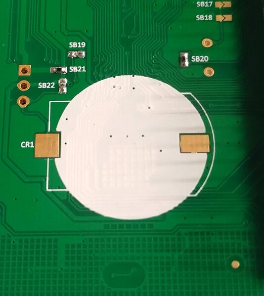 File:Unpopulated coin-cell holder.jpg