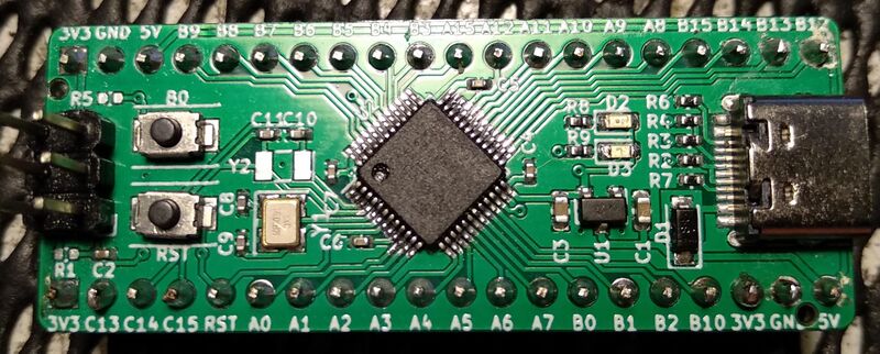 File:Green Pill rev. c - fully assembled top view.jpg
