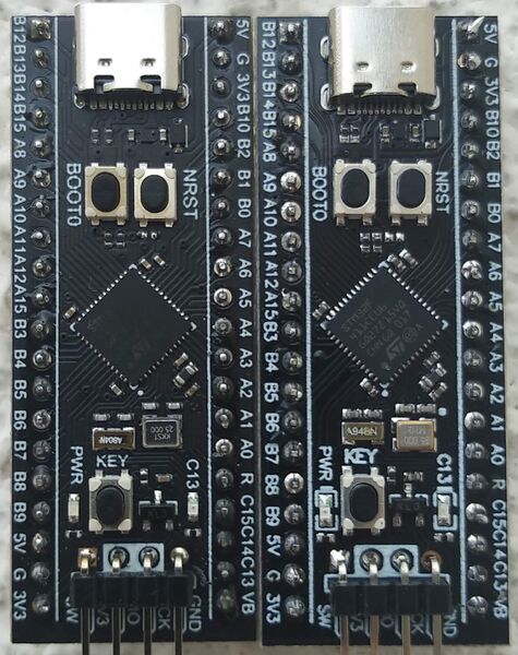 File:Two Black Pill Boards.jpg